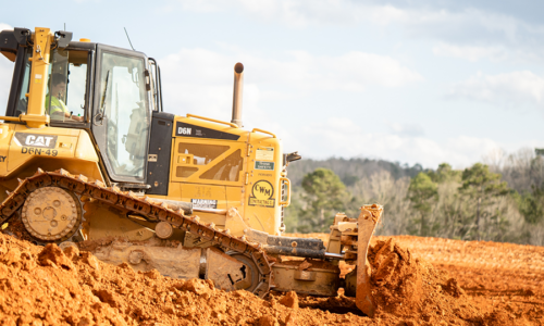 A bulldozer pushing dirt